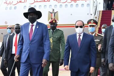 Egypt's President Abdel Fattah al-Sisi and South Sudan's President Salva Kiir, wearing protective face masks, are seen in Juba, South Sudan, November 28, 2020. The Egyptian Presidency via Reuters.