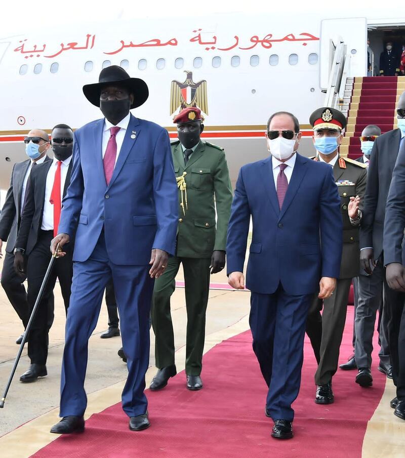 Egypt's President Abdel Fattah al-Sisi and South Sudan's President Salva Kiir, wearing protective face masks, are seen in Juba, South Sudan, November 28, 2020 in this handout picture courtesy of the Egyptian Presidency. The Egyptian Presidency/Handout via REUTERS ATTENTION EDITORS - THIS IMAGE WAS PROVIDED BY A THIRD PARTY.