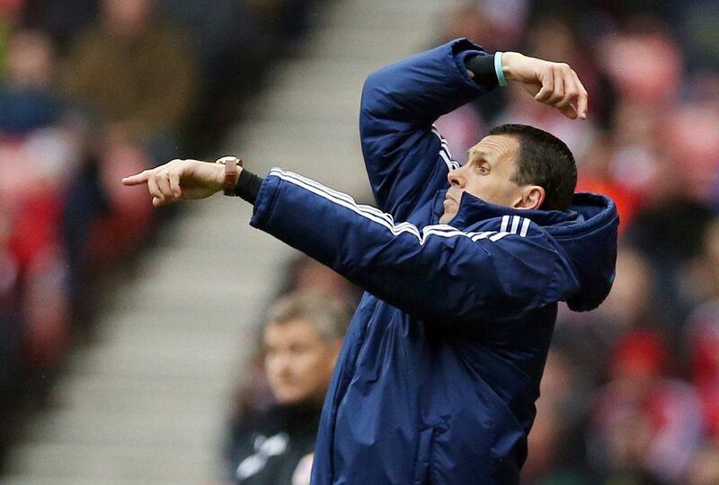 Sunderland manager Gus Poyet gestures during his side's win over Cardiff City on Sunday. Ian MacNicol / AFP / April 27, 2014