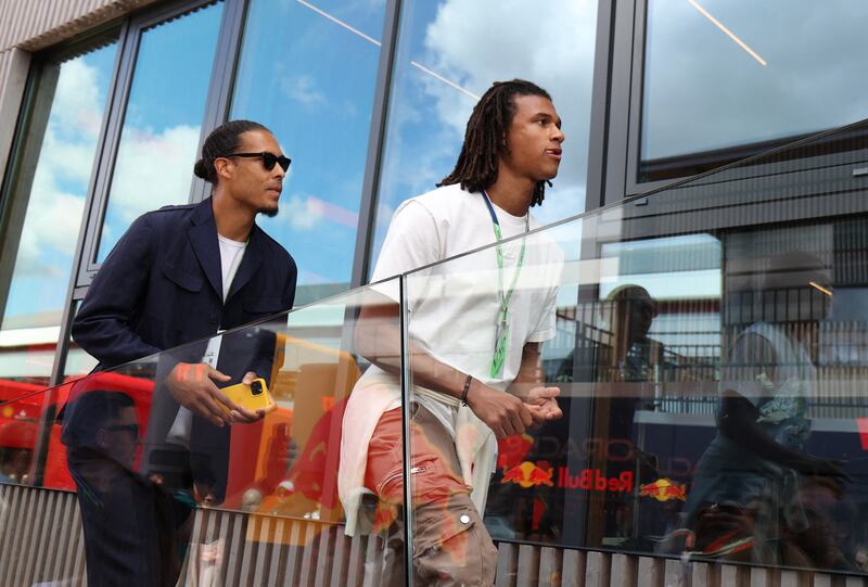 Liverpool star defender Virgil van Dijk and Manchester City's Nathan Ake arrive at Silverstone ahead of the British Grand Prix on July 3. Reuters