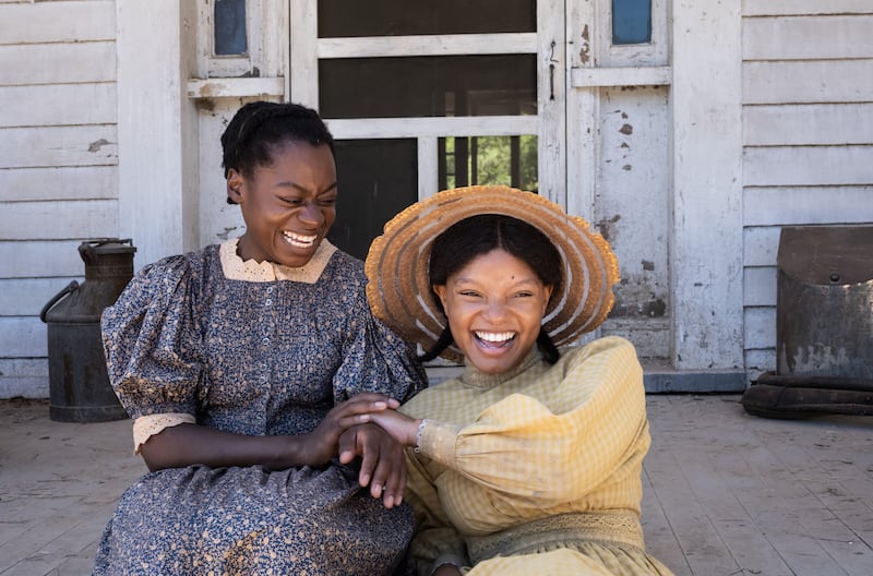 Phylicia Pearl as young Celie and Halle Bailey as young Nettie in The Color Purple. Photo: Warner Bros
