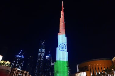 The Indian flag is projected on Burj Khalifa in Dubai on Sunday, in a show of solidarity with India as it battles a surge in Covid-19 cases. Pawan Singh / The National.