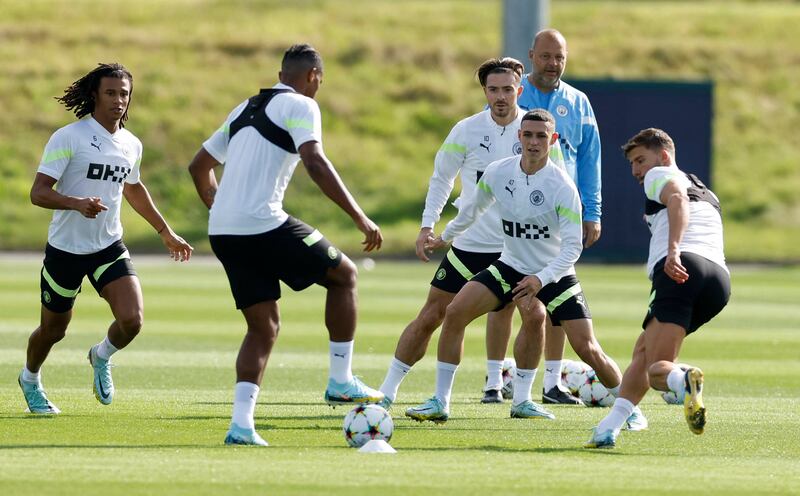 City players Nathan Ake, Phil Foden and Jack Grealish during training. Reuters