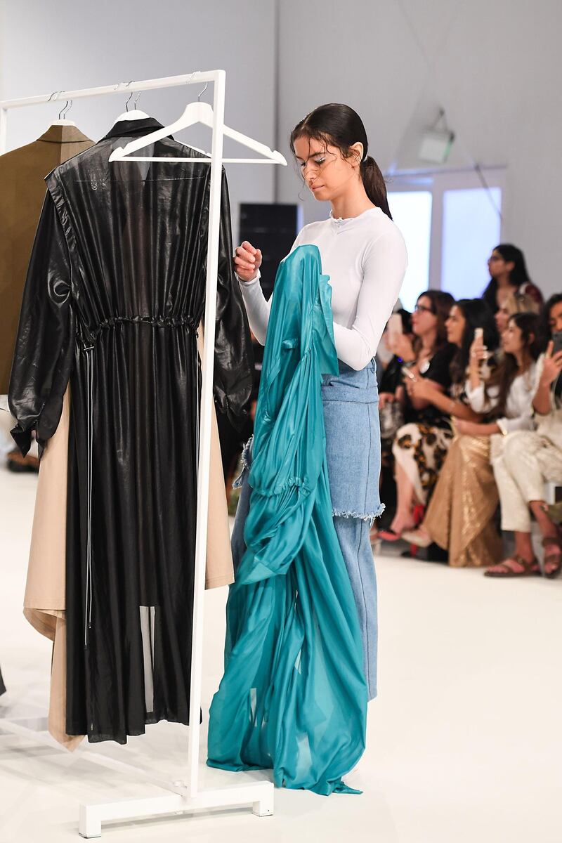 DUBAI, UNITED ARAB EMIRATES - OCTOBER 31: A model walks the runway at the Roni Helou and Hazem Kais show during the FFWD October Edition 2019 at the Dubai Design District on October 31, 2019 in Dubai, United Arab Emirates. (Photo by Stuart C. Wilson/Getty Images for FFWD)