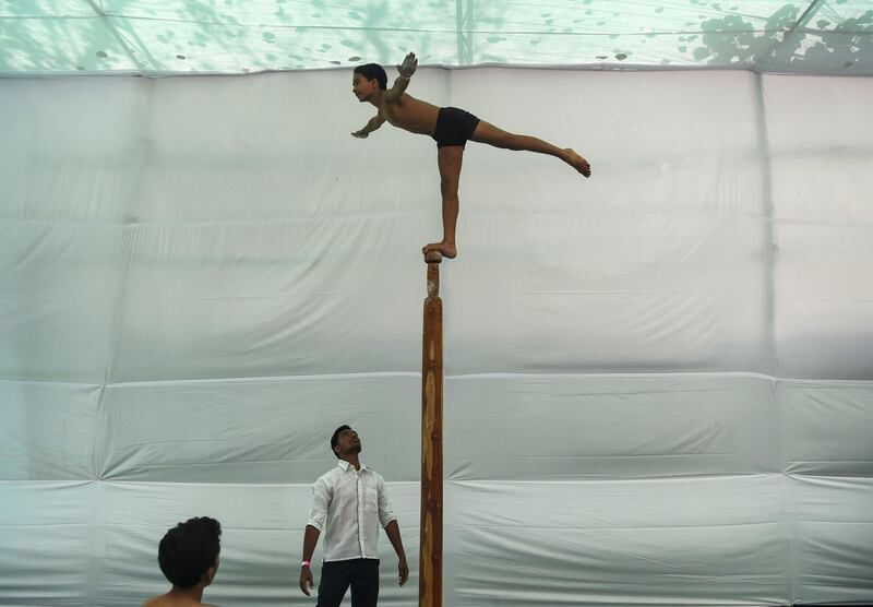 An Indian gymnast performs at the Mallakhamb World Championships in Mumbai. Some 100 competitors from 15 different countries take part on February 16 and 17. AFP