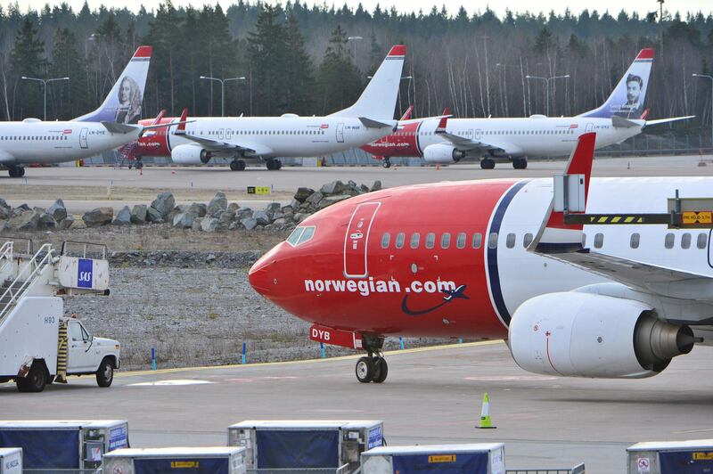 A view of parked aircrafts belonging to budget carrier Norwegian at Stockholm Arlanda Airport March 5, 2015. Budget carrier Norwegian Air Shuttle has held new talks with its striking pilots but no solution was found to the six-day conflict, a spokeswoman said on Thursday. At least 650 pilots are on strike, grounding many of the airline's flights within Norway, Sweden and Denmark, and between the three countries, while intercontinental flights and some European routes continue as planned.  REUTERS/Johan Nilsson/TT News Agency (SWEDEN - Tags: BUSINESS EMPLOYMENT TRANSPORT) 

ATTENTION EDITORS - THIS PICTURE WAS PROVIDED BY A THIRD PARTY. FOR EDITORIAL USE ONLY. NOT FOR SALE FOR MARKETING OR ADVERTISING CAMPAIGNS. THIS PICTURE IS DISTRIBUTED EXACTLY AS RECEIVED BY REUTERS, AS A SERVICE TO CLIENTS. SWEDEN OUT. NO COMMERCIAL OR EDITORIAL SALES IN SWEDEN. NO COMMERCIAL SALES - GM1EB351N2Z01