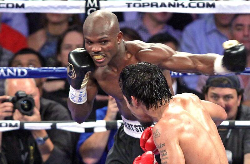 Timothy Bradley throws a punch at Manny Pacquiao during victory over the Filipino in their high-profile June 2012 bout. John Gurzinski / AFP