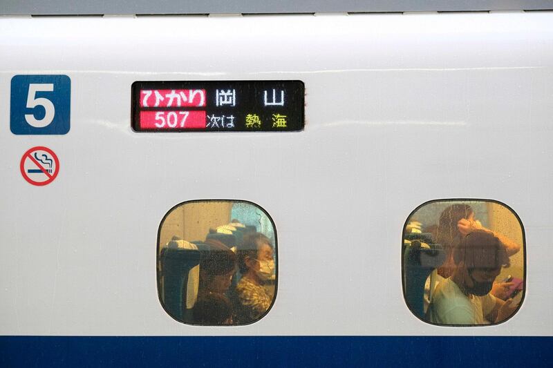 Passengers on a Shinkansen bullet train bound for Okayama leave a railway station in Yokohama, Kanagawa prefecture, Japan. AFP