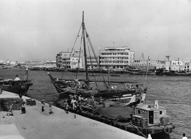 Ships in 1967 unloading goods on the creek for the Customs Department in Dubai. Getty Images