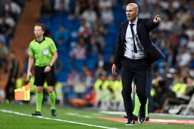 Real Madrid's French coach Zinedine Zidane gestures during the Spanish league football match between Real Madrid CF and CA Osasuna at the Santiago Bernabeu stadium in Madrid, on September 25, 2019. / AFP / OSCAR DEL POZO
