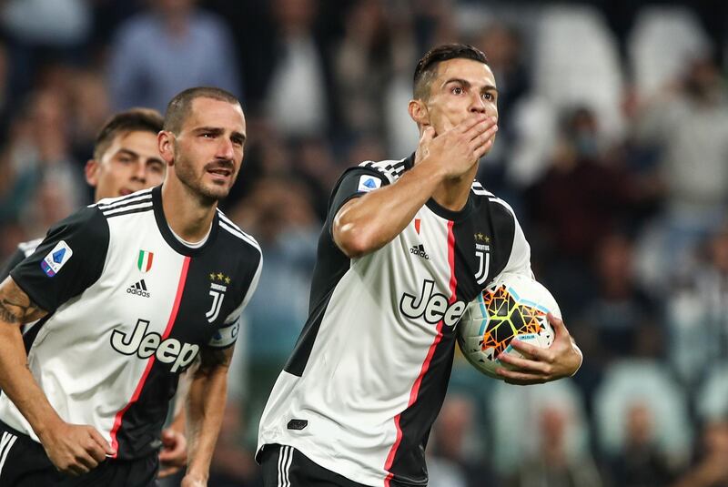 Juventus' Portuguese forward Cristiano Ronaldo celebrates after his penalty gave Juve a 2-1 lead against Hellas Verona. AFP