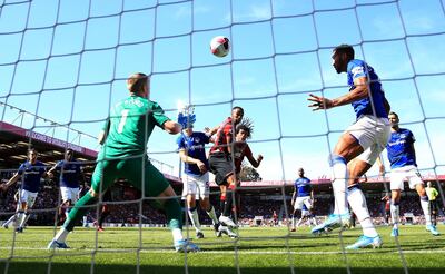 Bournemouth's Callum Wilson (centre) scores his side's first goal of the game during the Premier League match at The Vitality Stadium, Bournemouth. PA Photo. Picture date: Sunday September 15, 2019. See PA story SOCCER Bournemouth. Photo credit should read: Adam Davy/PA Wire. RESTRICTIONS: EDITORIAL USE ONLY No use with unauthorised audio, video, data, fixture lists, club/league logos or "live" services. Online in-match use limited to 120 images, no video emulation. No use in betting, games or single club/league/player publications.