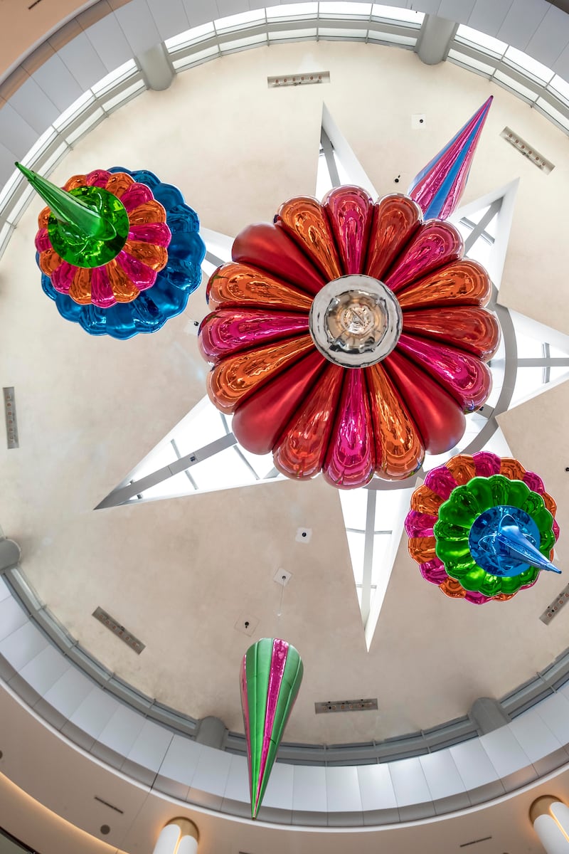 It hangs alongside four more giant festive ornaments in The Dubai Mall.