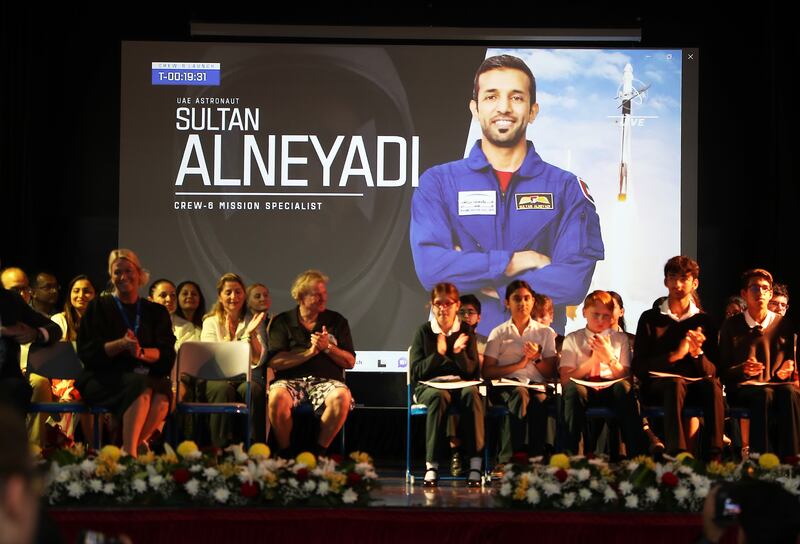 Pupils at Jumeirah College in Dubai listen to UAE astronaut Sultan Al Neyadi during his live call from the International Space Station. Pawan Singh / The National