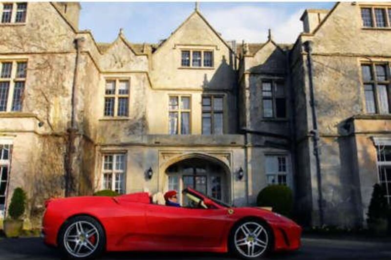 The writer's hired Ferrari F430 Spider  is parked outside the Greenway Hotel in Cheltenham.