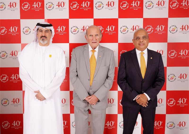 Colm McLoughlin, centre, is stepping down as Dubai Duty Free chief executive. Ramesh Cidambi, right, becomes the new managing director, while Salah Tahlak, left, will be deputy managing director. Photo: Dubai Duty Free