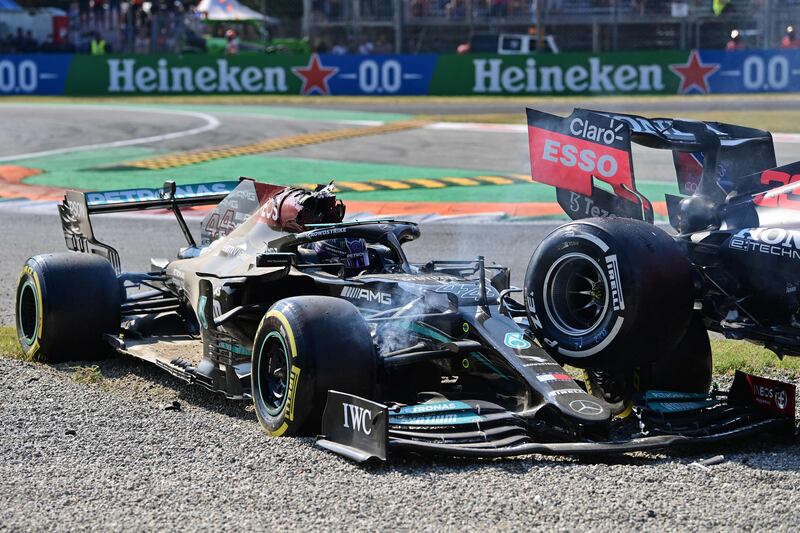 Mercedes' driver Lewis Hamilton following a collision with Red Bull's driver Max Verstappen. AFP