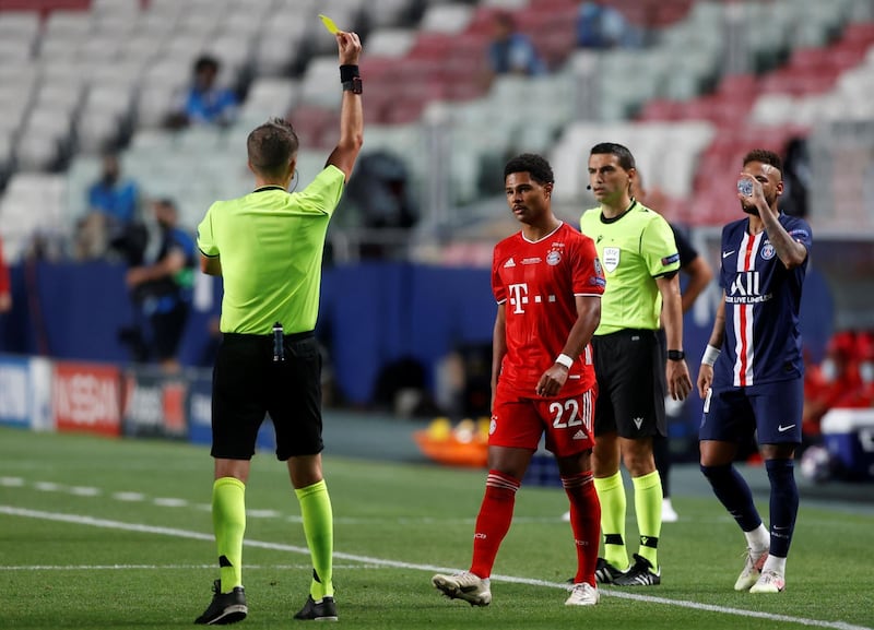 Bayern Munich's Serge Gnabry is booked by Italian referee Daniele Orsato. AFP