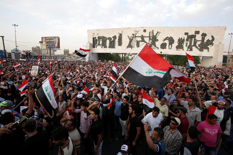 Supporters of prominent Iraqi Shi'ite cleric Moqtada al-Sadr gather  and chant slogans during a protest against government corruption at Tahrir Square in Baghdad, September 16, 2016. Khalid al Mousily / Reuters