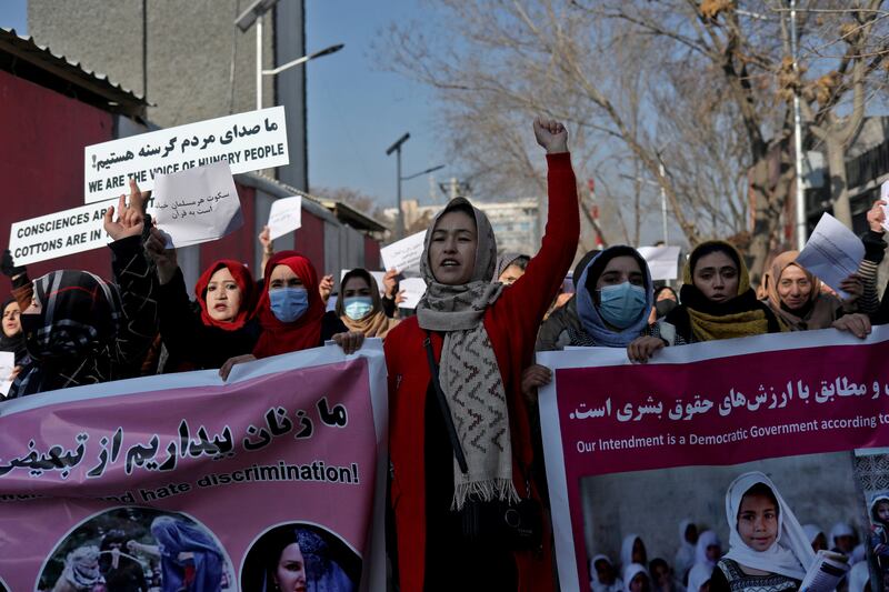 Women participate in a protest against Taliban restrictions in Afghanistan. Reuters