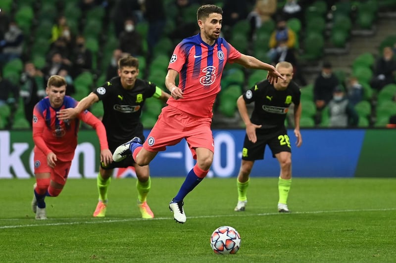 Chelsea's Italian midfielder Jorginho shoots from the penalty spot but sees his effort crash against the post. AFP