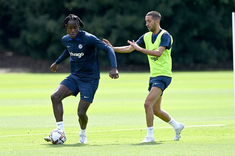 Trevoh Chalobah under pressure from Hakim Ziyech during training.
