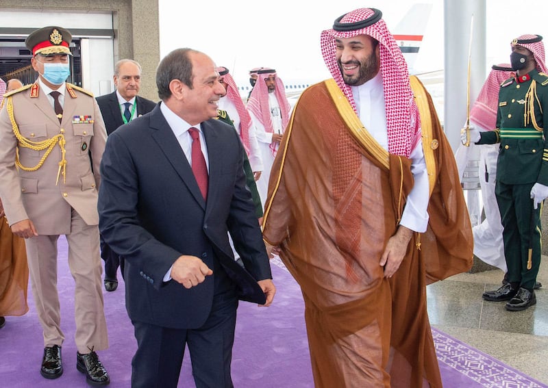 Egypt's President Abdel Fattah El Sisi speaks with Crown Prince Mohammed after arriving for the summit. SPA