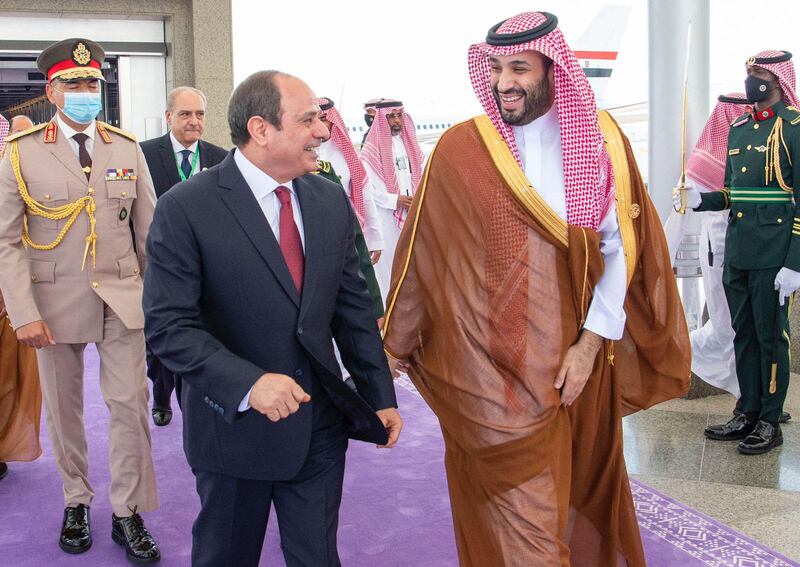 Egypt's President Abdel Fattah El Sisi speaks with Crown Prince Mohammed after arriving for the summit. SPA