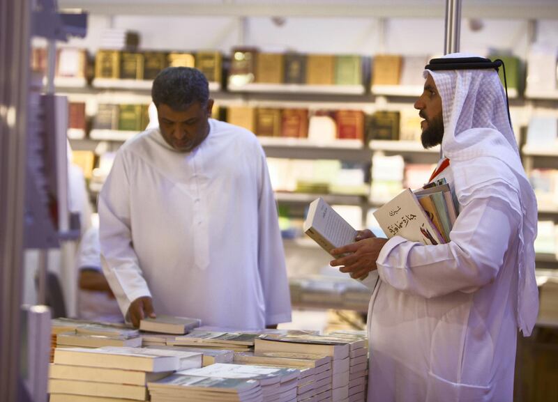 SHARJAH, UNITED ARAB EMIRATES - Visitors at The Sharjah Book Fair.  Leslie Pableo for The National