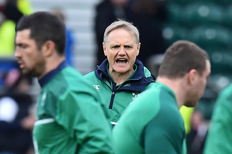 (FILES) In this file photo taken on February 27, 2016 Ireland's coach Joe Schmidt (C) watches training ahead of the Six Nations international rugby union match between England and Ireland at Twickenham in south west London on February 27, 2016.   Joe Schmidt is to step down as Ireland coach after World Cup, it was announced on November 26, 2018.  / AFP / BEN STANSALL                        
