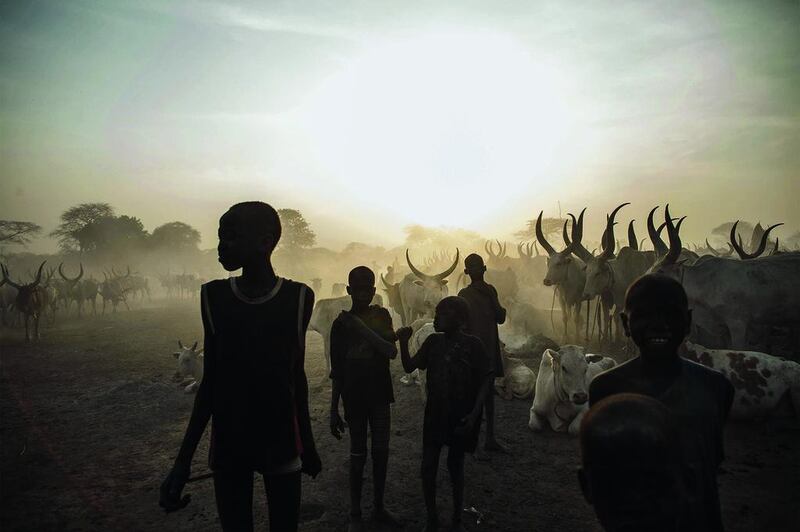 South Sudanese children from the Dinka ethnic group pose at cattle camp in the town of Yirol, in central South Sudan on February 12. UN leader Ban Ki-moon condemned on February 12 what he said was the use of cluster bombs in the war in South Sudan, a day after the opening of peace talks between South Sudan’s government and rebels. Troops loyal to President Salva Kiir and renegade soldiers who support his former vice president Riek Machar had been battling since mid-December. Fabio Bucciarelli / AFP