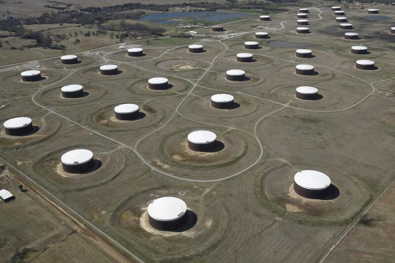 FILE PHOTO: Crude oil storage tanks are seen from above at the Cushing oil hub, in Cushing, Oklahoma, U.S., March 24, 2016.    REUTERS/Nick Oxford/File Photo