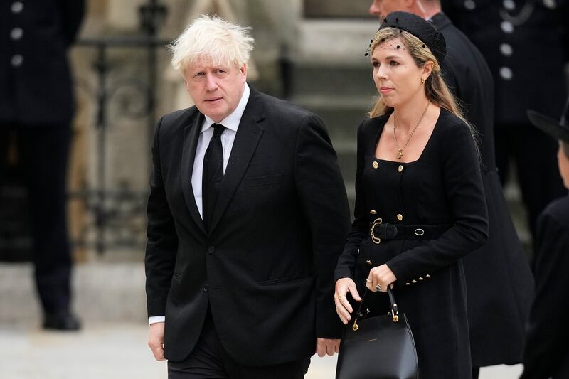 Mr Johnson and Carrie Johnson arrive at Westminster Abbey for the state funeral of Queen Elizabeth II in September 2022. Getty Images