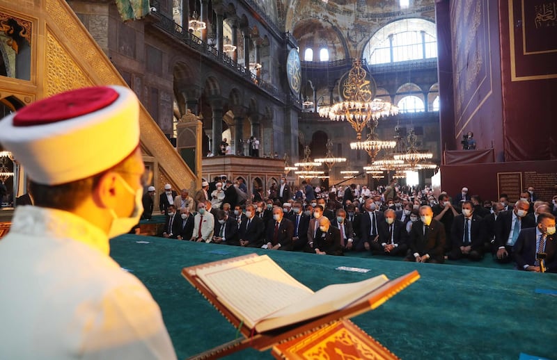 About 500 dignitaries were invited to attend the inaugural Friday prayers at the converted mosque. Turkish Presidential Service / AFP