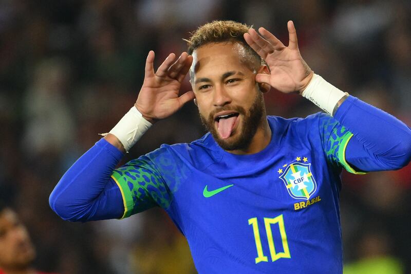 Brazil's star forward Neymar celebrates scoring his team's third goal during the friendly football match between Brazil and Tunisia. AFP