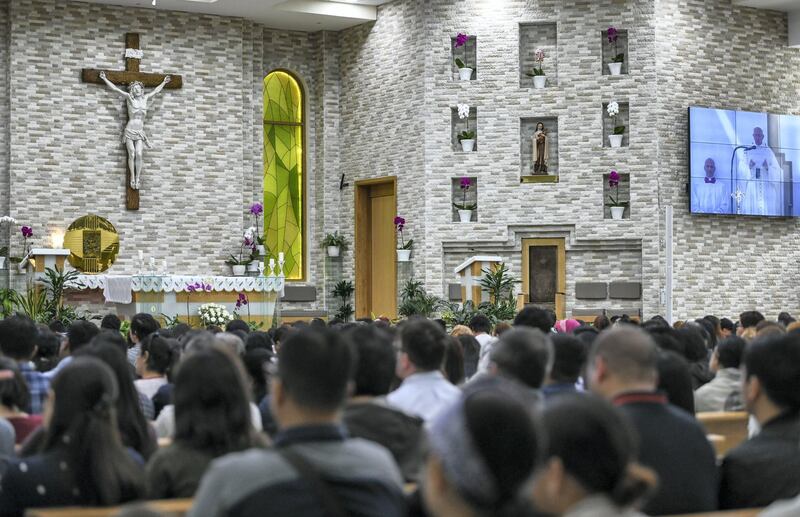 Abu Dhabi, United Arab Emirates - Worshippers view the historic Papal mass at St. JosephÕs Cathedral on February 5, 2019. Khushnum Bhandari for The National