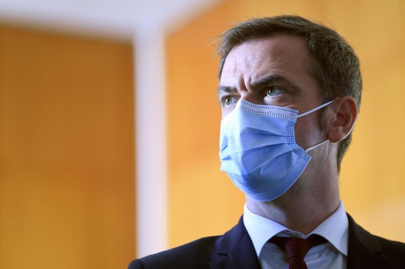 French Health Minister Olivier Veran looks on during a visit at the the Hopital Nord, in Marseille, southern France, as the country faces a new wave of infections to the Covid-19.  AFP