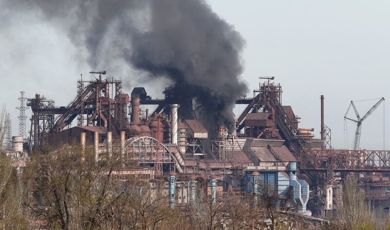 Smoke rises above the Azovstal steel works in the southern Ukrainian port city of Mariupol on April 25. Reuters