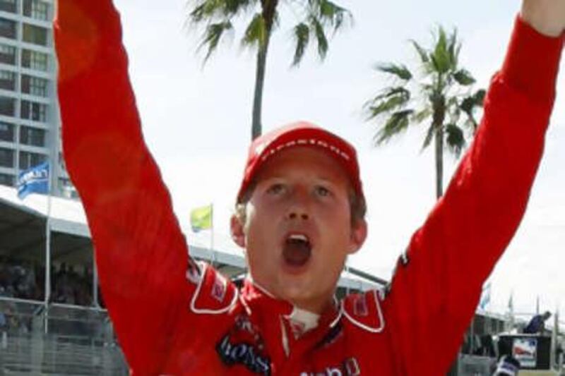 Ryan Briscoe celebrates after winning the non-chmpionship Indy Racing League at Surfers Paradise.