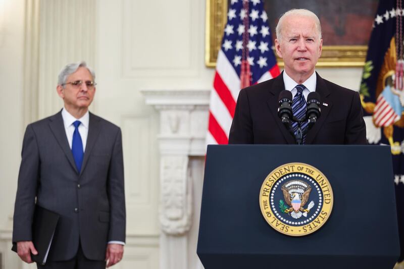 U.S. President Joe Biden speaks beside Merrick Garland, U.S. attorney general, in the Roosevelt Room of the White House in Washington, D.C., U.S., on Wednesday, June 23, 2021. President Biden will launch a comprehensive plan to curb gun crime, including by allowing states and municipalities to tap into coronavirus relief funding to hire police officers under certain circumstances. Photographer: Oliver Contreras/Sipa/Bloomberg