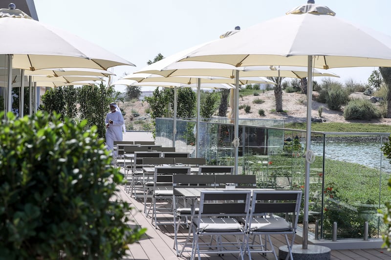 The outdoor dining terrace area at Roots.