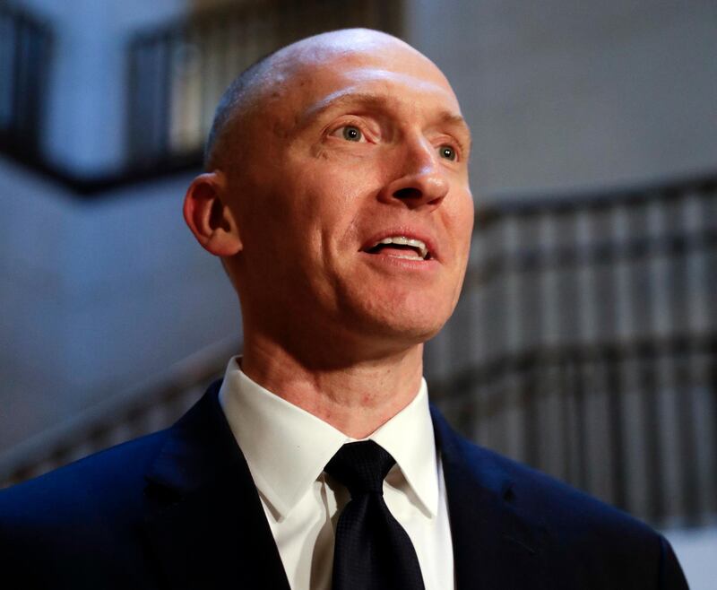 In this Nov. 2, 2017, file photo, Carter Page speaks with reporters following a day of questions from the House Intelligence Committee on Capitol Hill in Washington. A new congressional memo alleging FBI surveillance abuse is being used to undermine the legitimacy of special counsel Robert Muellerâ€™s Russia investigation. But included in the four-page document are revelations that might complicate the effort. (AP Photo/J. Scott Applewhite)
