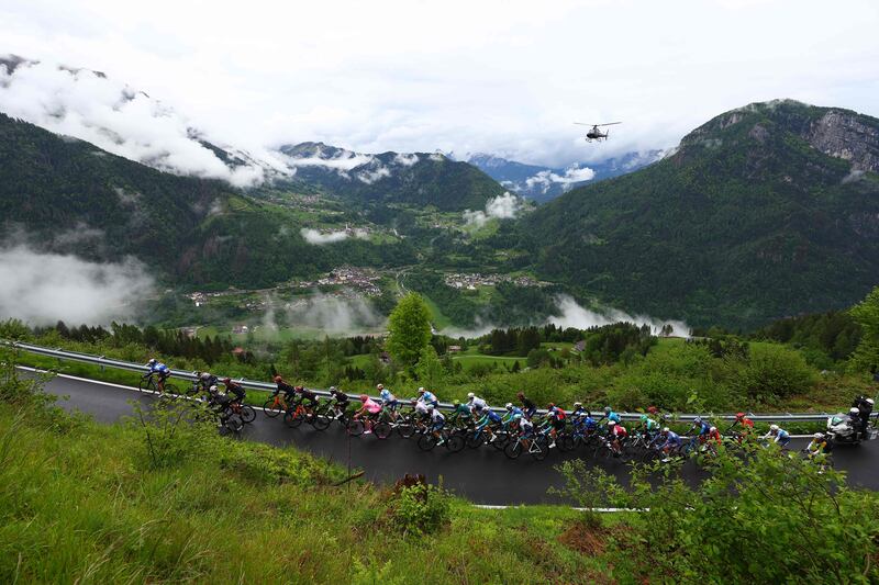 The peloton rides on Passo del Brocon during Stage 17. AFP
