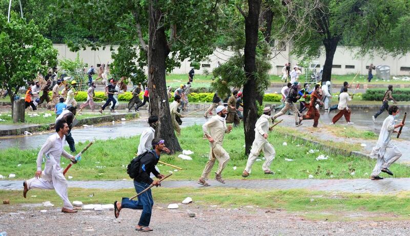 The military urged the government and protesters to settle their differences peacefully, but warned it was ‘committed to playing its part in ensuring security of the state’. Asif Hassan/AFP Photo