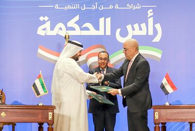 The agreement was signed by Egypt's Minister of Housing Assem El Gazzar, right, and the UAE’s Minister of Investment, Mohamed Alsuwaidi, in the presence of Egyptian Prime Minister Mostafa Madbouly, centre. Wam