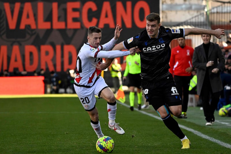 Real Sociedad's Alexander Sorloth battles with Rayo Vallecano's Ivan Balliu. AFP