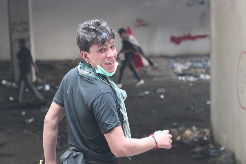 Yaser Mohsen, 23, races through the Turkish restaurant building a wide grin on his face. He swears he will not abandon the building to security forces. Pesha Magid