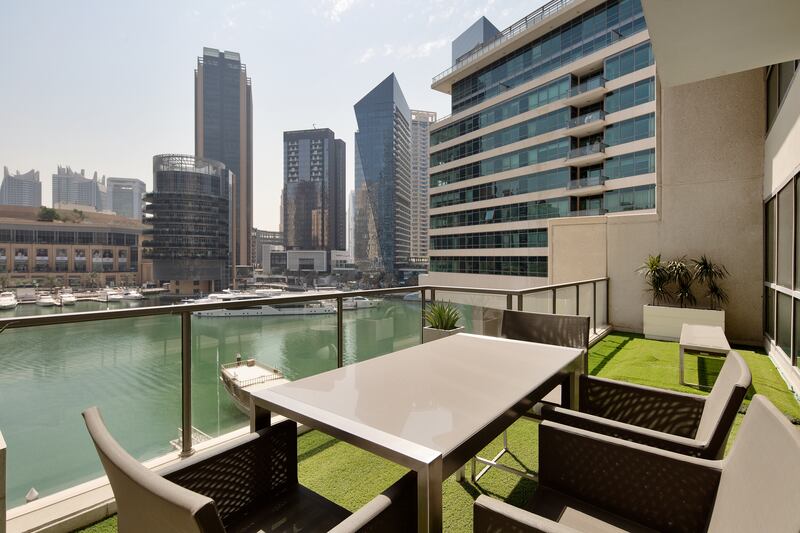 Outside there is a large terrace that acts as a garden with Dubai Marina views.