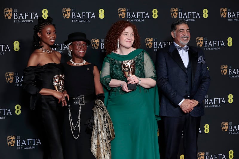 Elizabeth Rufai, Flo Wilson, Yasmin Afifi and Sayed Badreya pose with the British Short Film awards for Jellyfish and Lobster. Getty Images