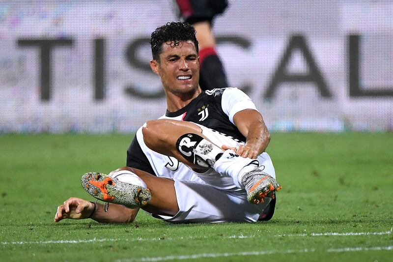 Juventus' Cristiano Ronaldo takes a tumble. Reuters